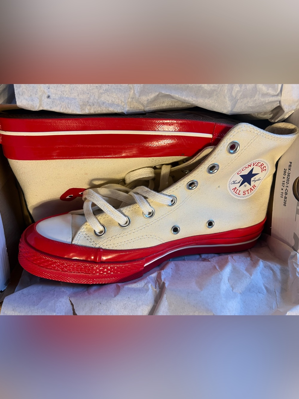 Converse Cream Canvas High Top Sneakers with Red Sole
